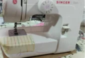 SEWING MACHING BARELY USED