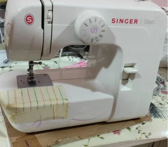 SEWING MACHING BARELY USED