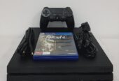 PS4 Pro 1TB Console with 1 Controller + CD Bundle