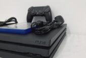 PS4 Pro 1TB Console with 1 Controller + CD Bundle