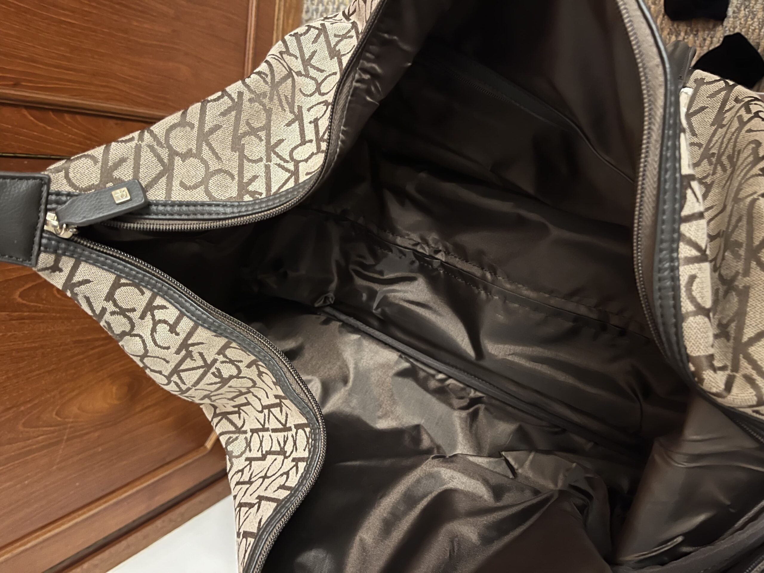 Calvin Klein Rolling Travel Duffel – 19″ Size